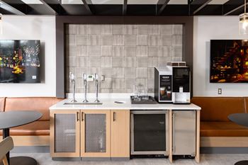 a kitchen with a counter top and a coffee machine